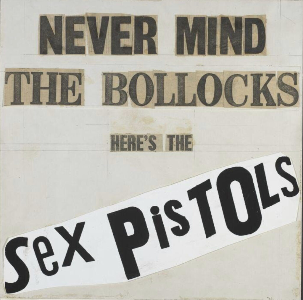 A collage of words and letters cut from various printed matter, reading NEVER MIND THE BOLLOCKS HERE’S THE SEX PISTOLS
